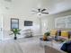 Inviting living room with stylish decor, plush rug, and comfortable seating arrangement at 1203 W 20Th St, Sanford, FL 32771