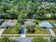 Aerial view of the home showcasing its location within a lush, tree-lined neighborhood at 1229 Jeffery Dr, Port Orange, FL 32129