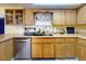 An eat-in kitchen featuring light wood cabinetry and a stainless steel dishwasher at 1229 Jeffery Dr, Port Orange, FL 32129