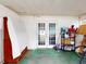A view of the back porch with its storage and entrance to the home at 1229 Jeffery Dr, Port Orange, FL 32129