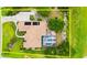 Aerial view of the home showcasing the roof, pool, and large lot at 1324 Dovercourt Ln, Ormond Beach, FL 32174