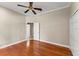 Spacious bedroom featuring hardwood floors and a ceiling fan at 1324 Dovercourt Ln, Ormond Beach, FL 32174