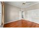 Bedroom featuring hardwood floors, double closets, and neutral paint at 1324 Dovercourt Ln, Ormond Beach, FL 32174
