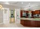 Gourmet kitchen featuring granite countertops and stainless steel appliances at 1324 Dovercourt Ln, Ormond Beach, FL 32174