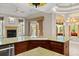 Spacious kitchen with custom island, marble countertops, and access to the living area at 1324 Dovercourt Ln, Ormond Beach, FL 32174