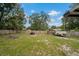 Spacious backyard featuring a wooden fence and some sparse landscaping at 137 Fort Smith Blvd, Deltona, FL 32738