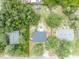 Aerial view of the property featuring a spacious backyard with mature trees at 1398 5Th Ave, Deland, FL 32724
