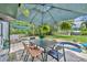 Deck with outdoor dining area, great backyard, swing, pool for entertaining at 1398 5Th Ave, Deland, FL 32724