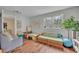 Inviting playroom with a cozy couch, ' toys, and natural light from the window at 1398 5Th Ave, Deland, FL 32724