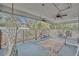Relaxing covered porch with hanging hammocks and outdoor seating area at 1398 5Th Ave, Deland, FL 32724