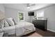 This bedroom has two windows to give the room a bright, airy feel at 1402 E Voorhis Ave, Deland, FL 32724