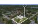 Aerial view of a property in a neighborhood, with a lake visible in the distance at 1411 Cliff Ave, Eustis, FL 32726