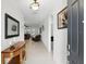 Welcoming foyer with neutral tile flooring leading to a spacious living area at 1444 Daystar Ln, Deltona, FL 32725
