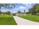 Charming single-story home with a well-manicured lawn and a covered carport at 1518 Lakeside Dr, Deland, FL 32720