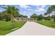 Charming ranch style home with new driveway and mature landscaping at 1518 Lakeside Dr, Deland, FL 32720