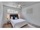 Inviting bedroom is enhanced by ample natural light and a ceiling fan at 152 Sweetgum Ln, Port Orange, FL 32129