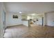 Open kitchen and dining area with white cabinets and modern appliances at 152 Sweetgum Ln, Port Orange, FL 32129