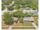 An elevated view captures a residential neighborhood, displaying cozy homes and tree-lined streets at 1610 Brady Dr, Deltona, FL 32725