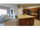 Spacious kitchen featuring an island, stainless steel appliances, and ample counter space for preparing meals at 1632 Blue Grass Blvd, Deland, FL 32724