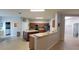 Spacious kitchen with an island, sleek appliances, and lots of counter space, ideal for cooking and entertaining at 1632 Blue Grass Blvd, Deland, FL 32724