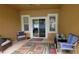 Covered patio with neutral tones, tile floor, ceiling fan, and furniture at 1632 Blue Grass Blvd, Deland, FL 32724