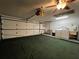 Spacious garage featuring laundry area and plenty of room for storage or activities at 180 Pine Grove Ct, Daytona Beach, FL 32119