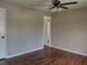 Bedroom with hardwood floor and neutral paint at 1821 Talmadge St, Deland, FL 32724