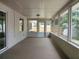Bright enclosed patio featuring an abundance of natural light and an inviting connection to the outdoors at 1821 Talmadge St, Deland, FL 32724
