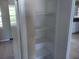 Spacious linen closet with multiple shelves to provide plenty of storage space throughout the home at 1821 Talmadge St, Deland, FL 32724