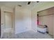 Spacious bedroom with neutral walls, modern flooring, and ample closet space at 1828 West Pkwy, Deland, FL 32724