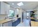Bright kitchen featuring stainless appliances, white subway tile, butcher block, and lots of natural light at 1828 West Pkwy, Deland, FL 32724