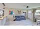 Inviting living room with stylish decor, hardwood floors, and a comfortable sofa at 1828 West Pkwy, Deland, FL 32724