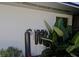 External water filtration system with lush tropical plants near the entrance at 1828 West Pkwy, Deland, FL 32724
