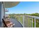 Balcony with seating and views of the landscape at 2 Oceans West Blvd # 305, Daytona Beach, FL 32118