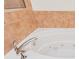 Close-up of a soaking tub featuring a chrome faucet and soothing jets at 2 Oceans West Blvd # 305, Daytona Beach, FL 32118