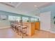 Entertaining space with a kitchen, granite countertop, and seating at 2 Oceans West Blvd # 305, Daytona Beach, FL 32118