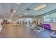 Well-equipped gym with various machines, weights, and ample space for exercise at 2 Oceans West Blvd # 305, Daytona Beach, FL 32118