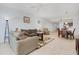 Open living area with comfortable seating, dining space, and well-lit atmosphere at 2 Oceans West Blvd # 305, Daytona Beach, FL 32118