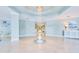 Grand lobby with elegant lighting, decorative artwork, and a central table at 2 Oceans West Blvd # 305, Daytona Beach, FL 32118