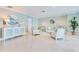 Bright common room with comfortable seating and coastal decor at 2 Oceans West Blvd # 305, Daytona Beach, FL 32118