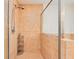 Modern shower featuring a glass partition, tiled walls, and rainfall shower head at 2 Oceans West Blvd # 305, Daytona Beach, FL 32118