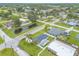 High definition aerial image of a home in a quaint neighborhood with small pond at 203 Fox Pl, Port Orange, FL 32127
