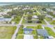 Community aerial view of a neighborhood home situated near a pond at 203 Fox Pl, Port Orange, FL 32127