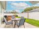 Backyard featuring outdoor seating and string lights at 203 Fox Pl, Port Orange, FL 32127