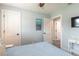 Bedroom view featuring light blue walls and white trim at 203 Fox Pl, Port Orange, FL 32127