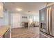 Bright, open-concept space featuring a kitchen, dining area, and living room at 203 Fox Pl, Port Orange, FL 32127