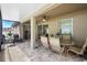 Covered patio with outdoor dining set and outdoor furniture at 218 Wellington Woods Ave, Deland, FL 32724