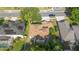 Aerial view showcasing the home's architecture, manicured lawn, and proximity to neighborhood amenities at 227 Blue Crystal Dr, Deland, FL 32720