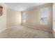 Cozy bedroom with carpet, neutral walls, and bright windows offering natural light at 227 Blue Crystal Dr, Deland, FL 32720