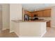Well-designed kitchen with stainless steel appliances and breakfast bar seating at 227 Blue Crystal Dr, Deland, FL 32720